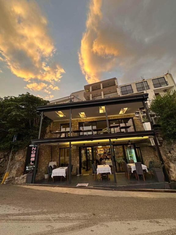 Hotel NOBEL Ulcinj - hotel and restaurant terrace at sunset in Ulcinj, Montenegro